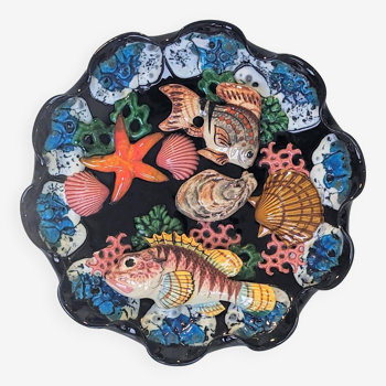 Trompe l'oeil porcelain plate dish in Vallauris polychrome earthenware with sea fish decoration.