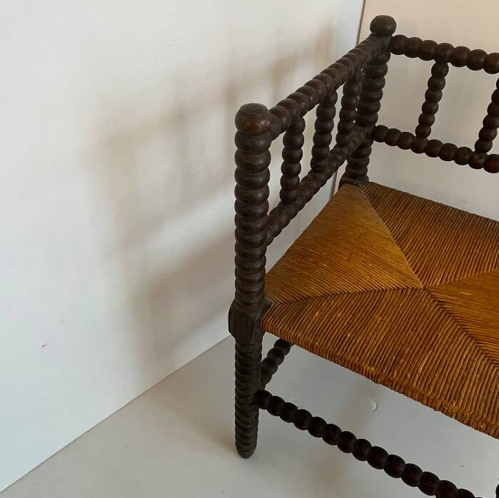 Antique wood and straw fireside seat