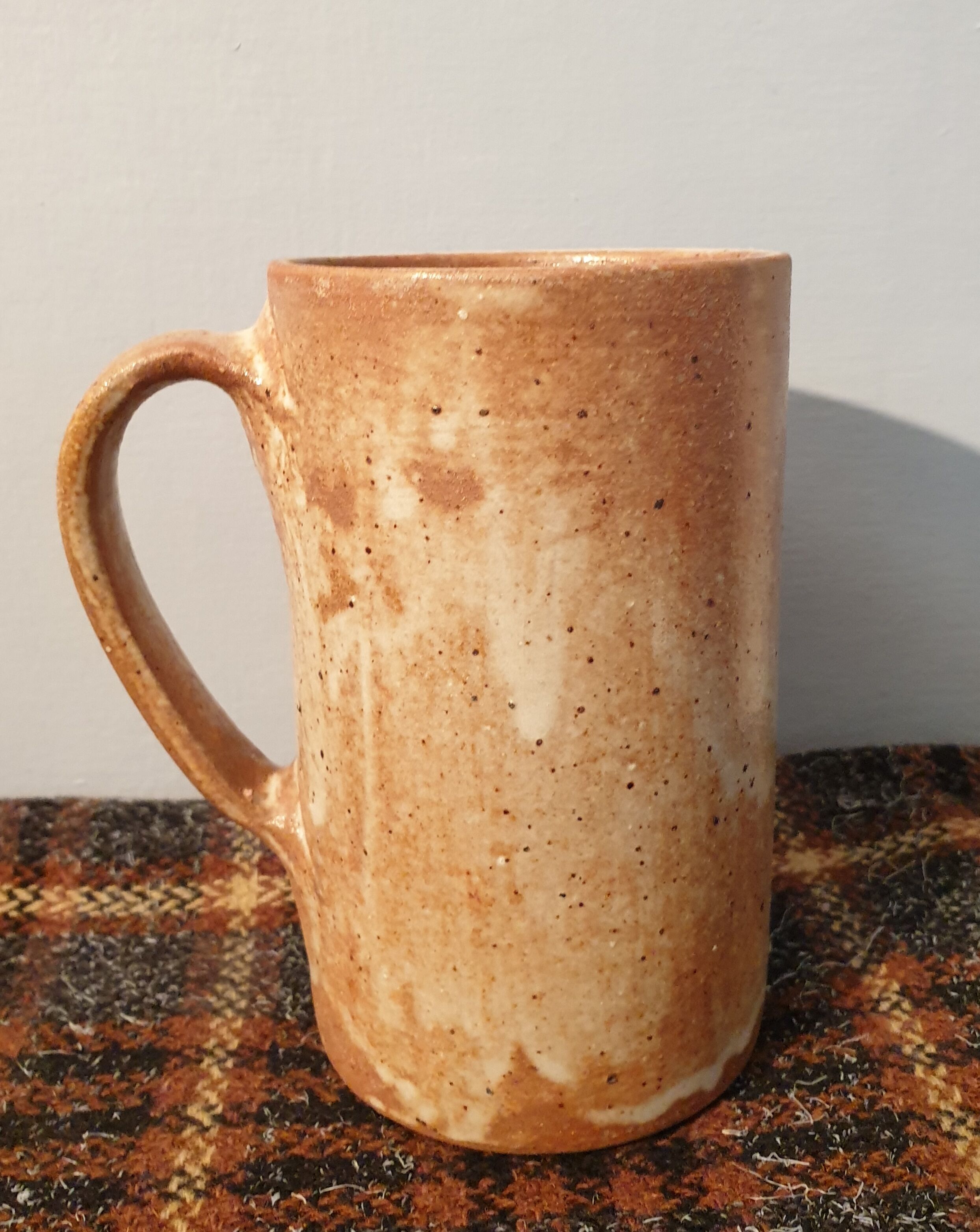 Suite of 4 sandstone mugs