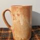 Suite of 4 sandstone mugs