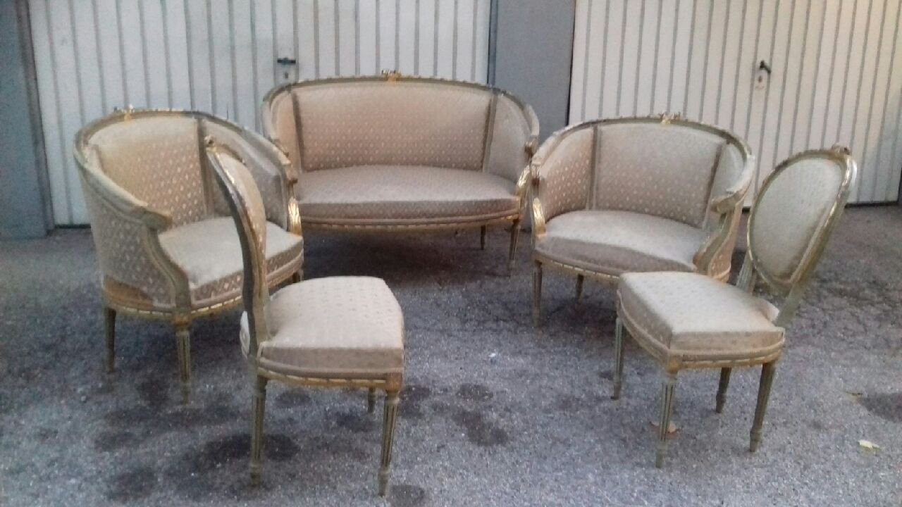Golden lounge two armchairs and a gondola-shaped sofa and a pair of Louis XVI chairs