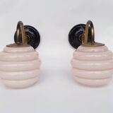 Swan neck wall lights in brass and glass