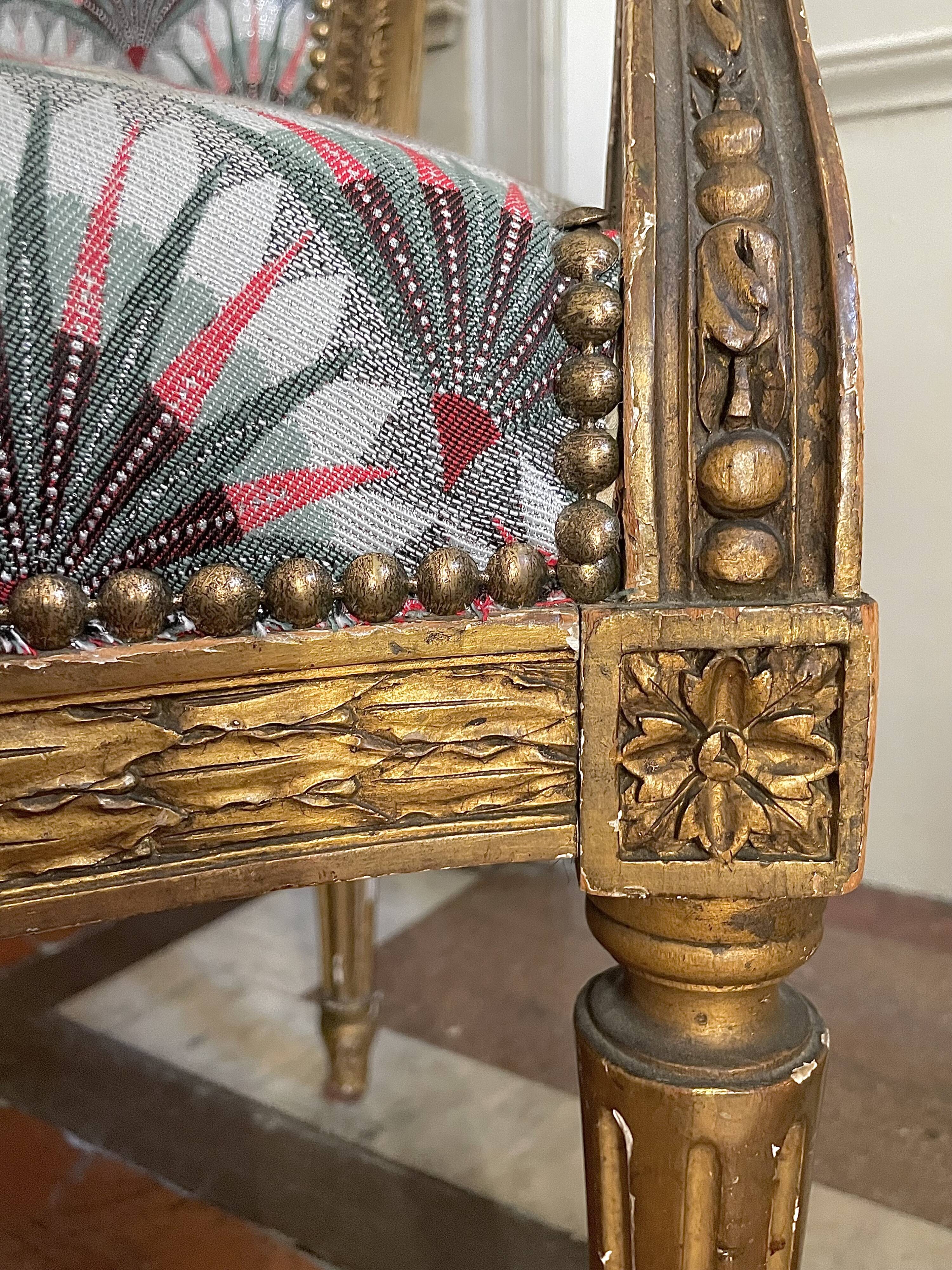 Paire de fauteuils Louis XVI restaurés