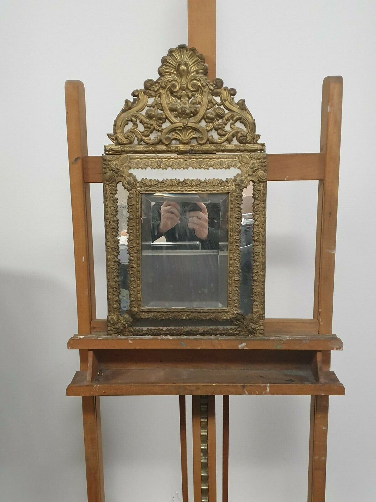 Old bevel mirror with metal parcloses pushed back Louis XIV style