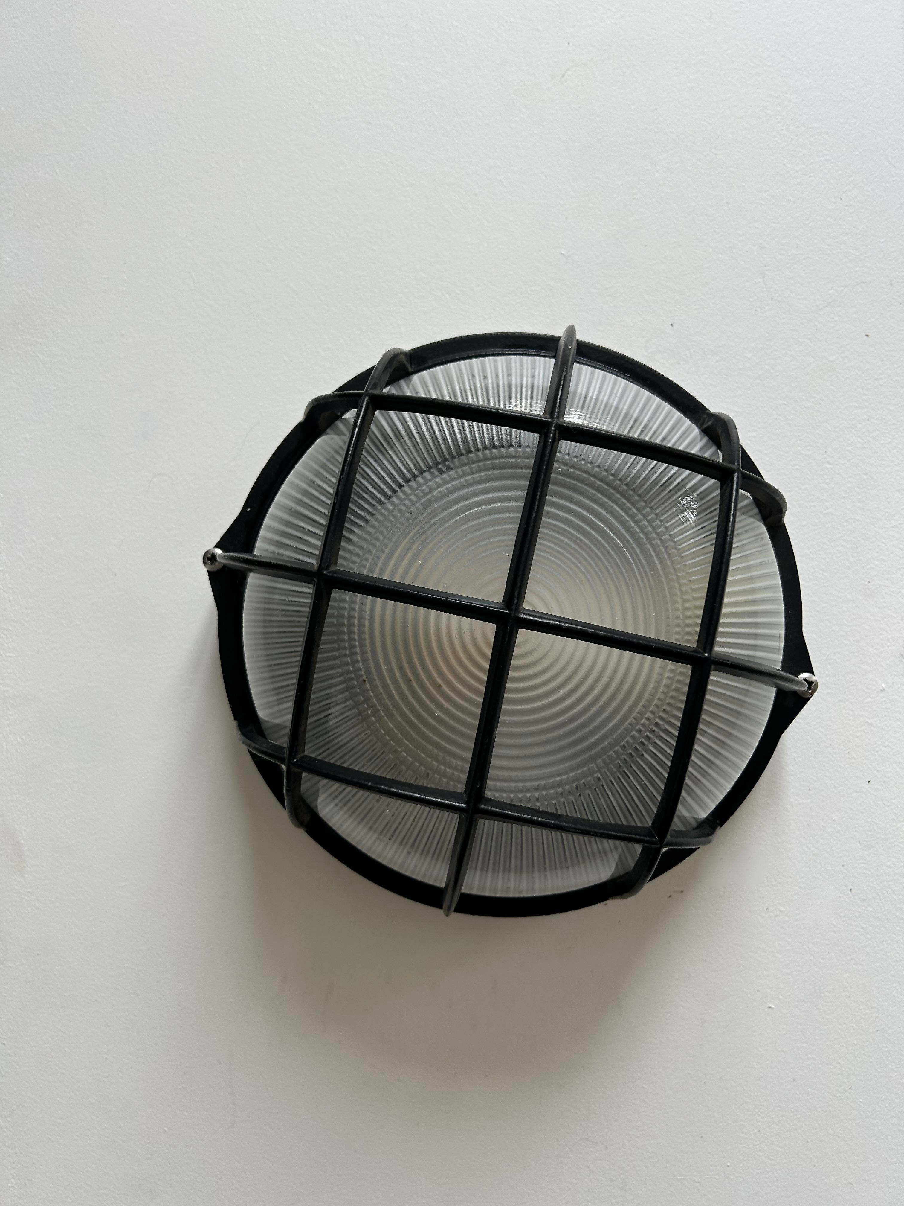 Vintage wall lamp, black metal and ridged glass, France 1980.