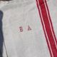 Lot of 5 old tea towels with 2 red linen and cotton beds