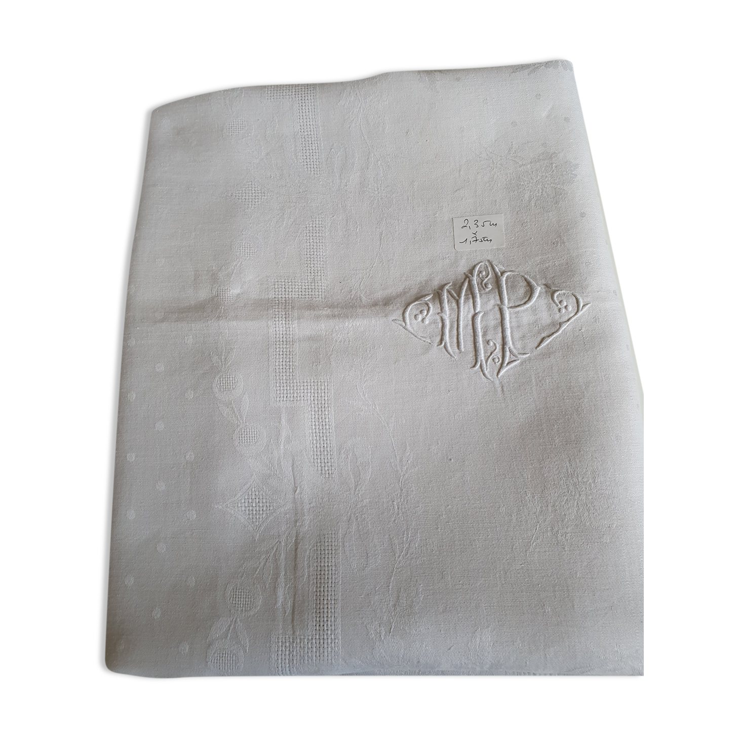 Old tablecloth in damask