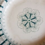 A plate made of earthenware decorated with flower crown
