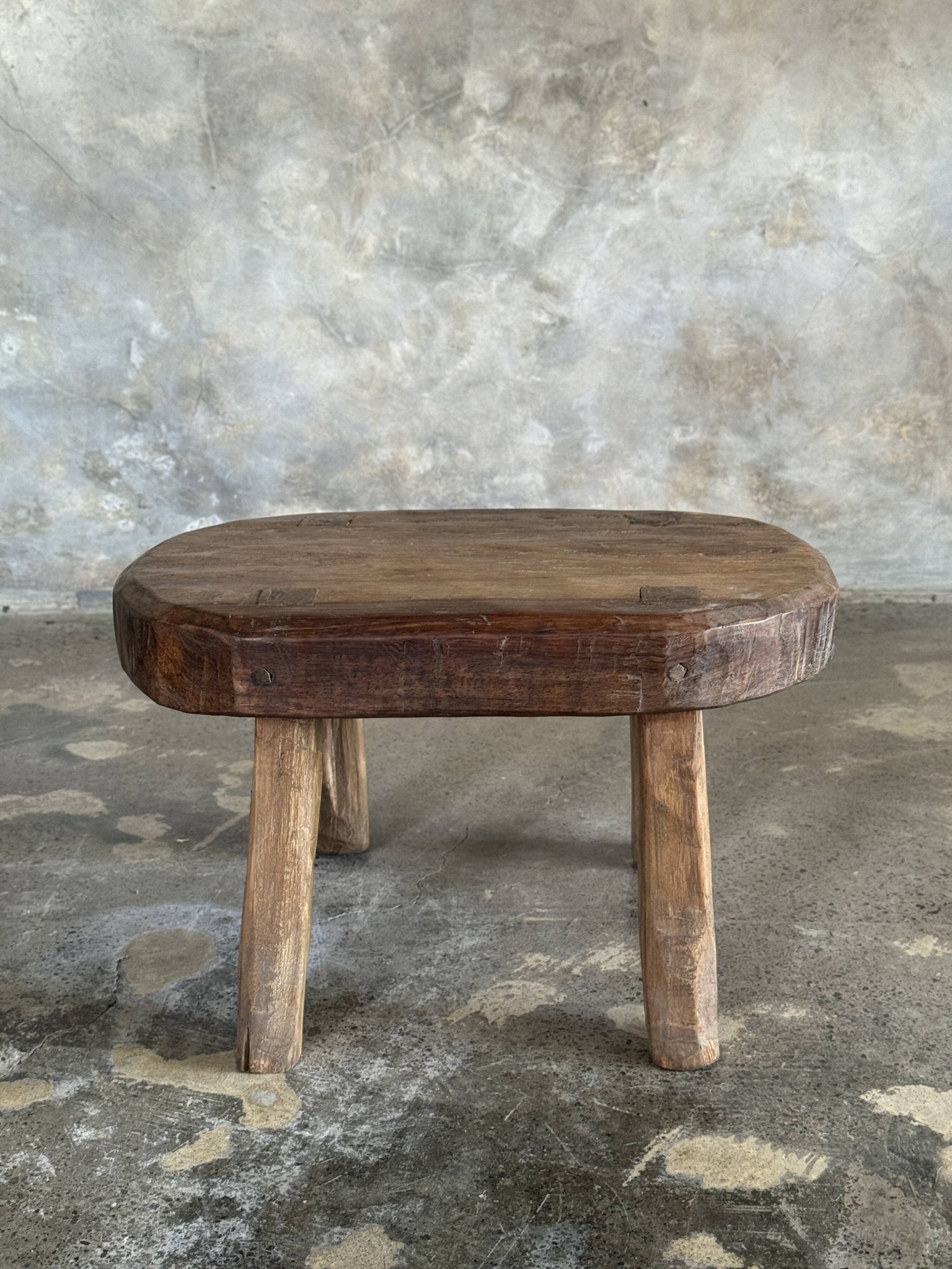 Small stool, oval solid teak accent stool with a two-tone seat.