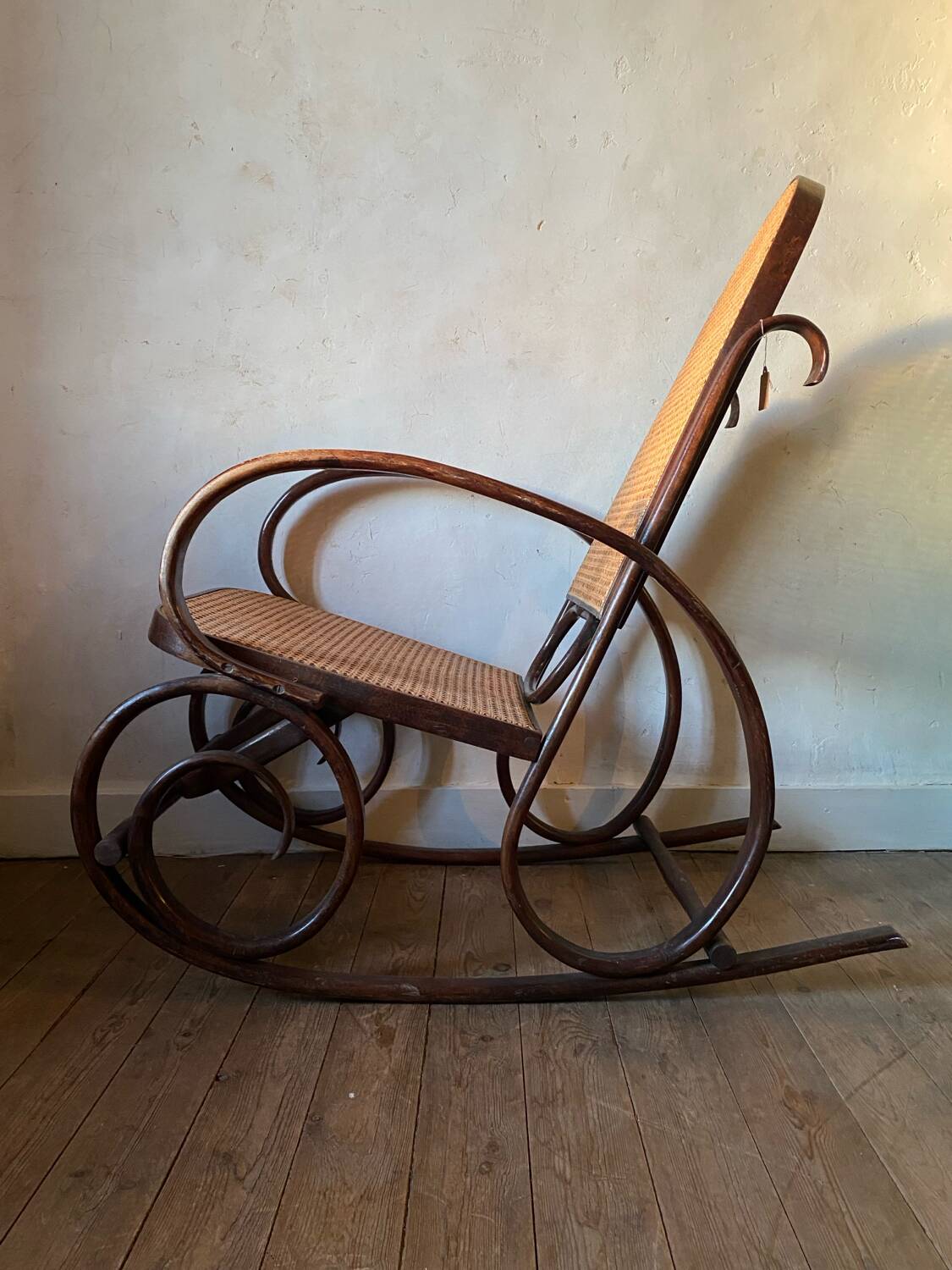 Wood and cane rocking chair