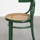Vintage green bistro chair with woven reed seat