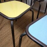 8 canteen chairs, yellow, blue, and red Formica with metal tubing from the 1950s-60s.