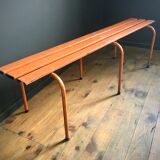 Old orange metal bench