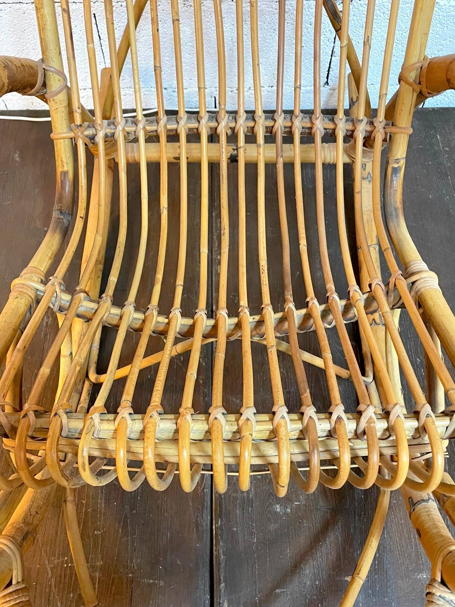 Vintage rocking chair in rattan by Rohé (Holland) from the 1960s.
