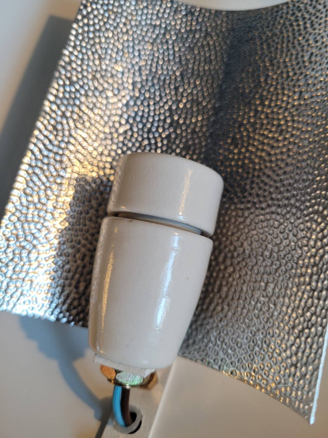 Gold and cream white saucer wall sconce