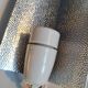 Gold and cream white saucer wall sconce