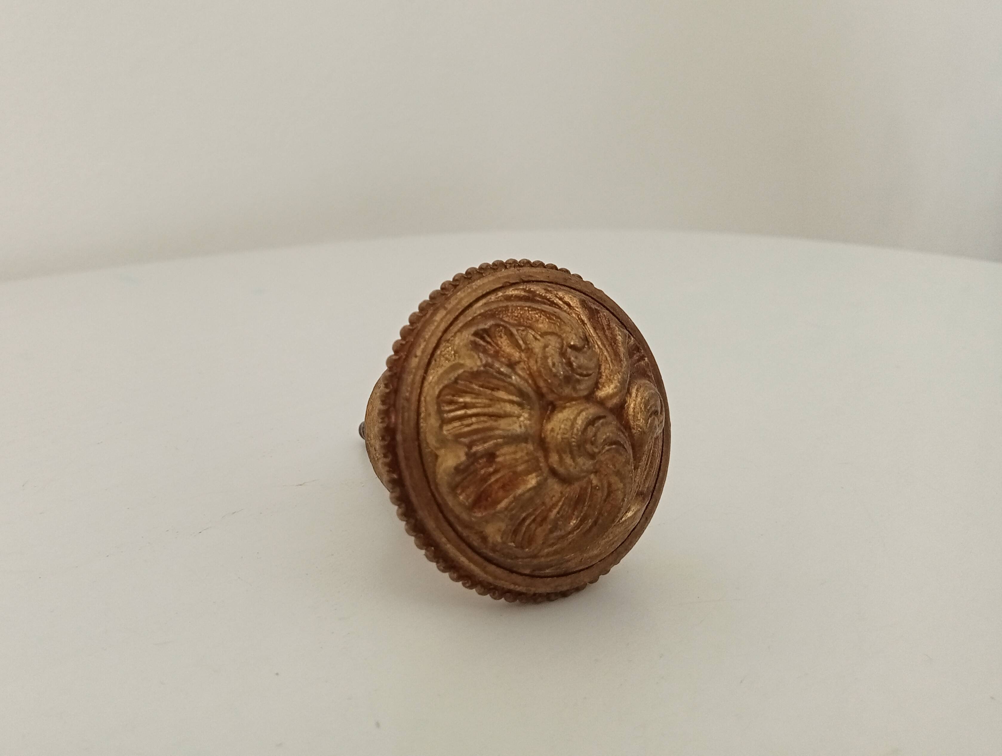 Antique furniture handle in chiseled solid bronze