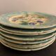8 dessert plates in late 19th century dabbling