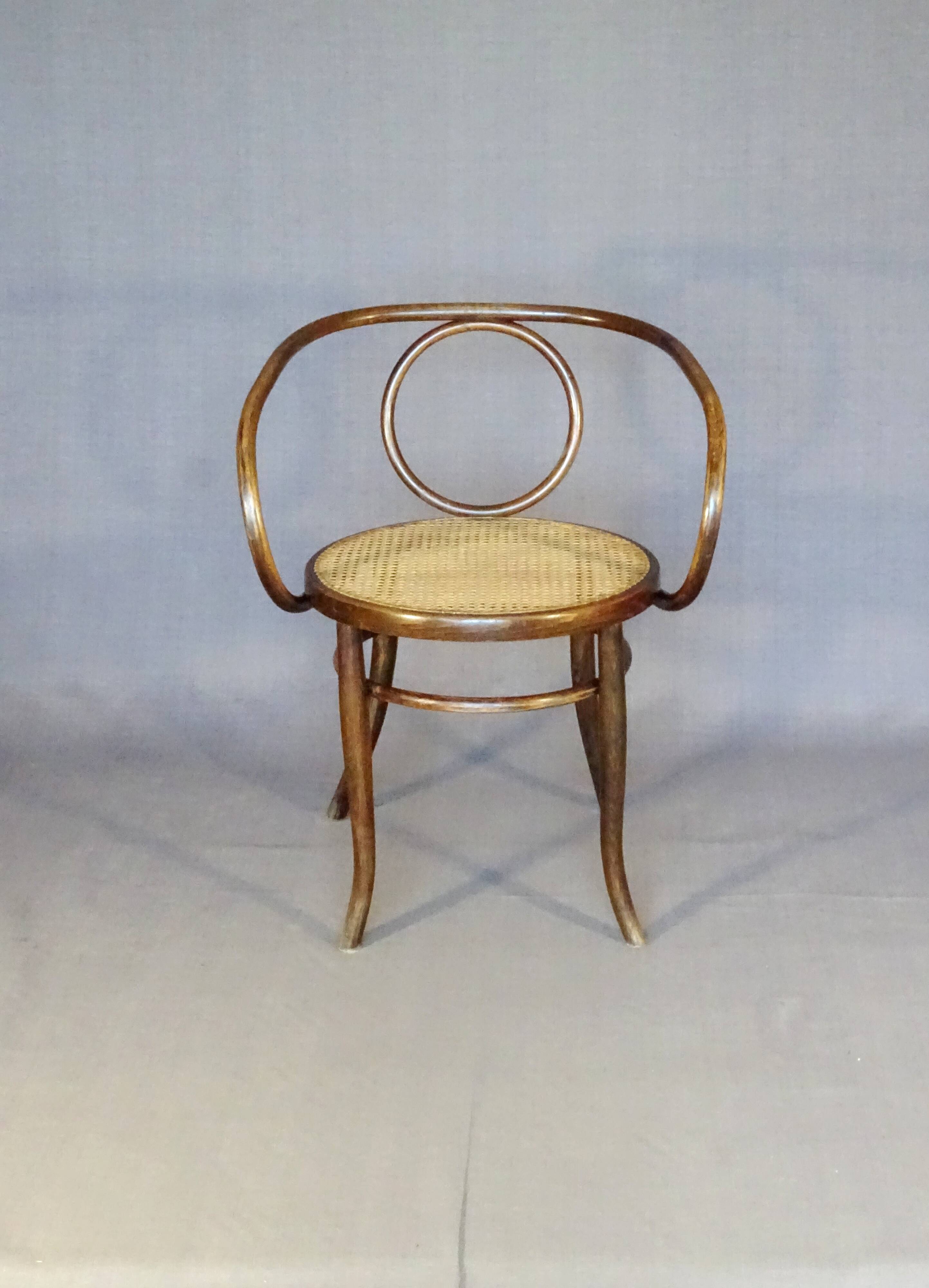Le Corbusier armchair by Fischel 1890 caned, not Thonet.