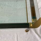 Glass and brass coffee table