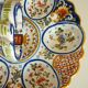 Dish, egg server in hand-painted earthenware, signed Geo Martel