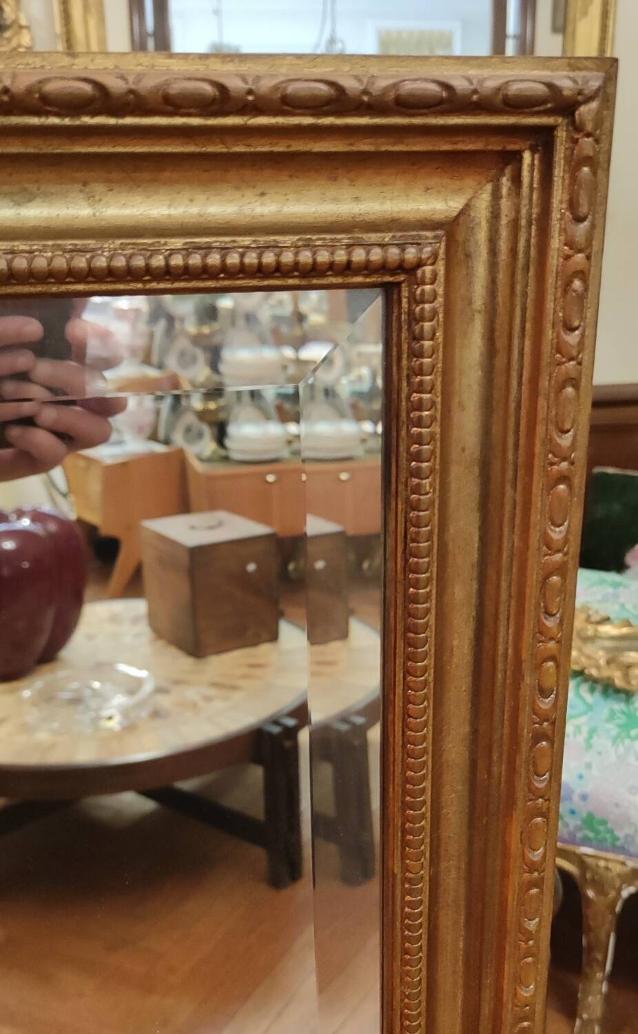 Old beveled mirror with gilded wood frame 20th century