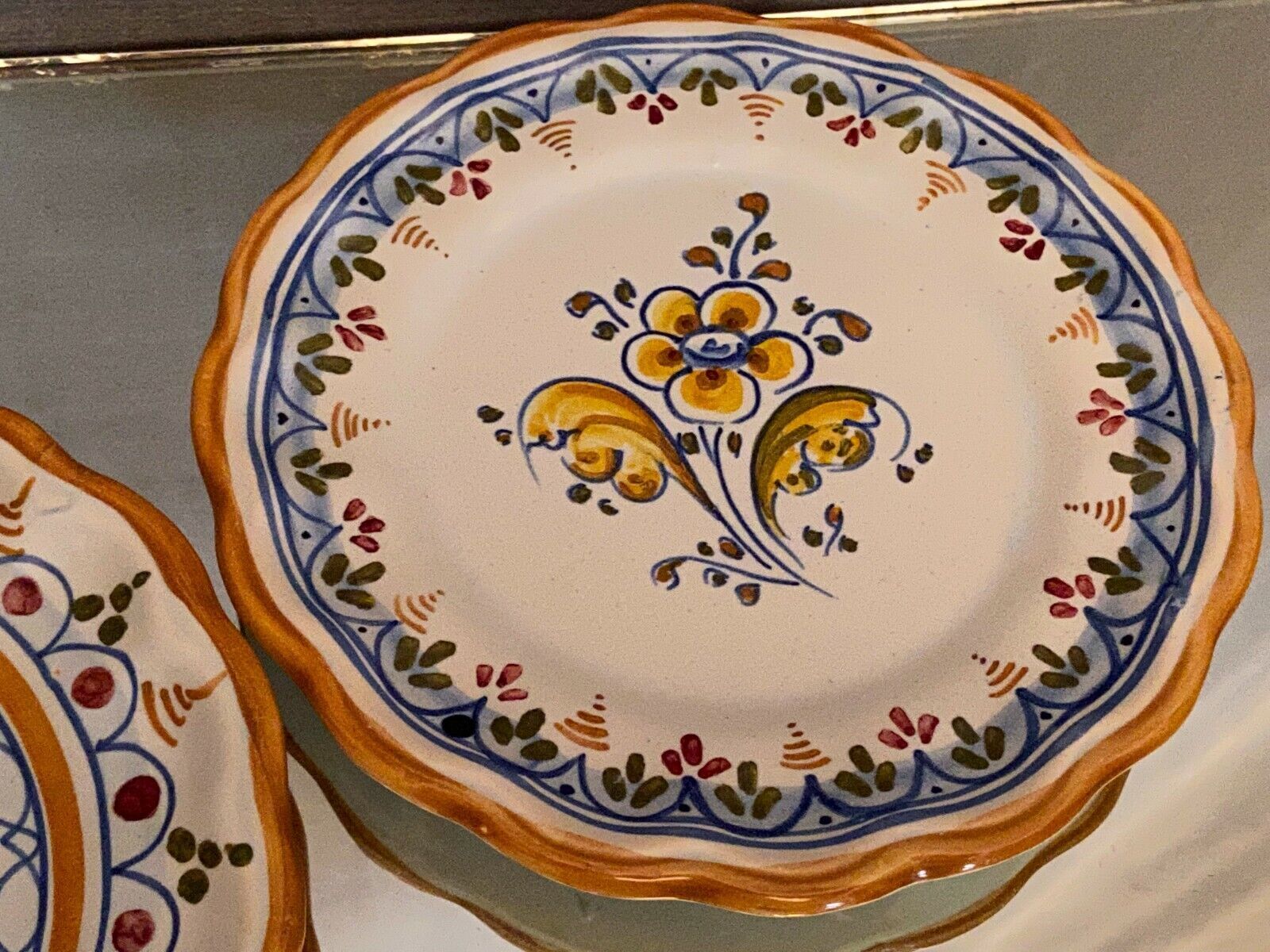 Pair of Talavera earthenware plates with floral decoration