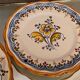 Pair of Talavera earthenware plates with floral decoration