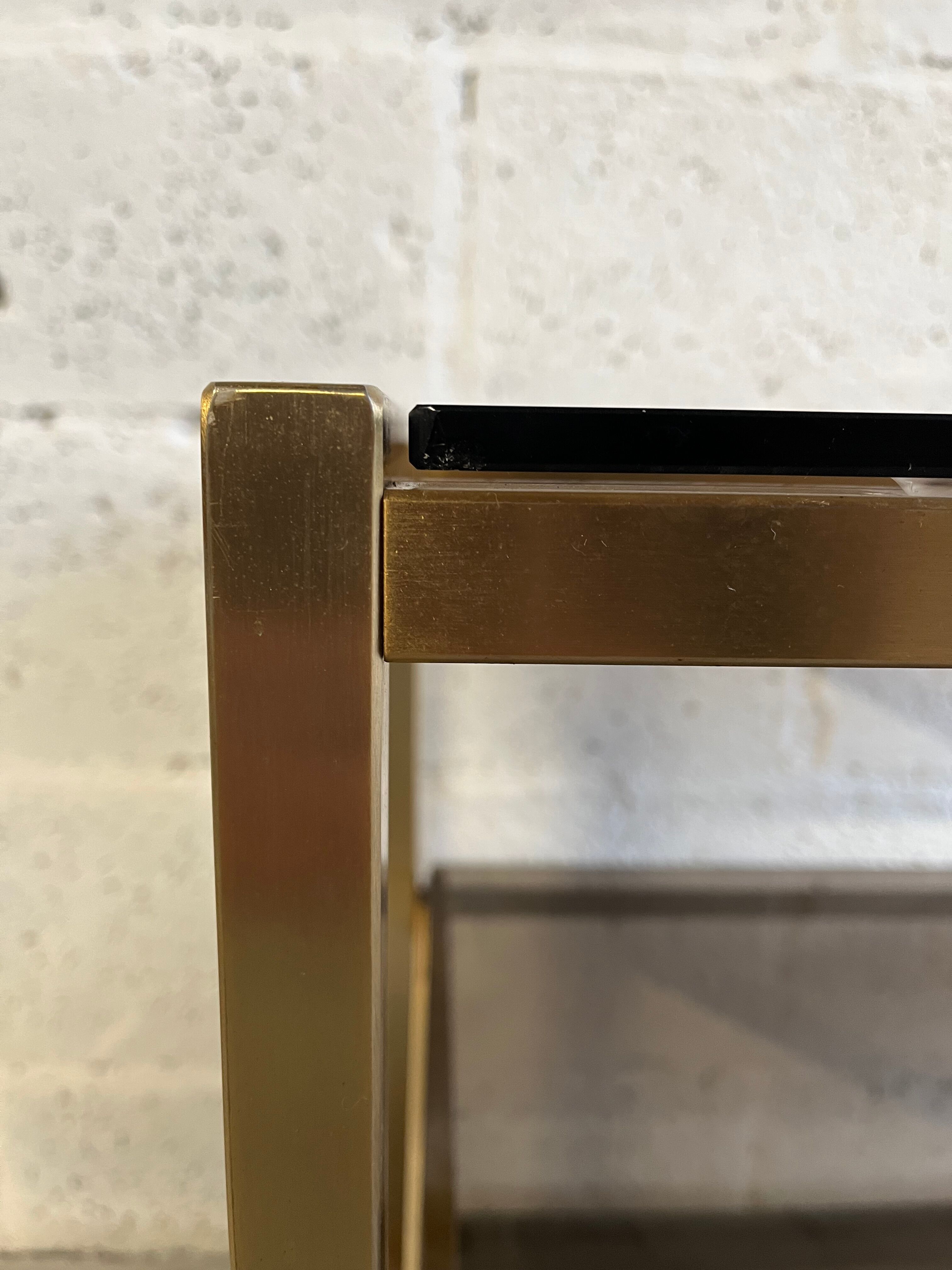 Gold metal and smoked glass serving trolley from the 70s