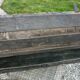 Old bulging wooden travel trunk