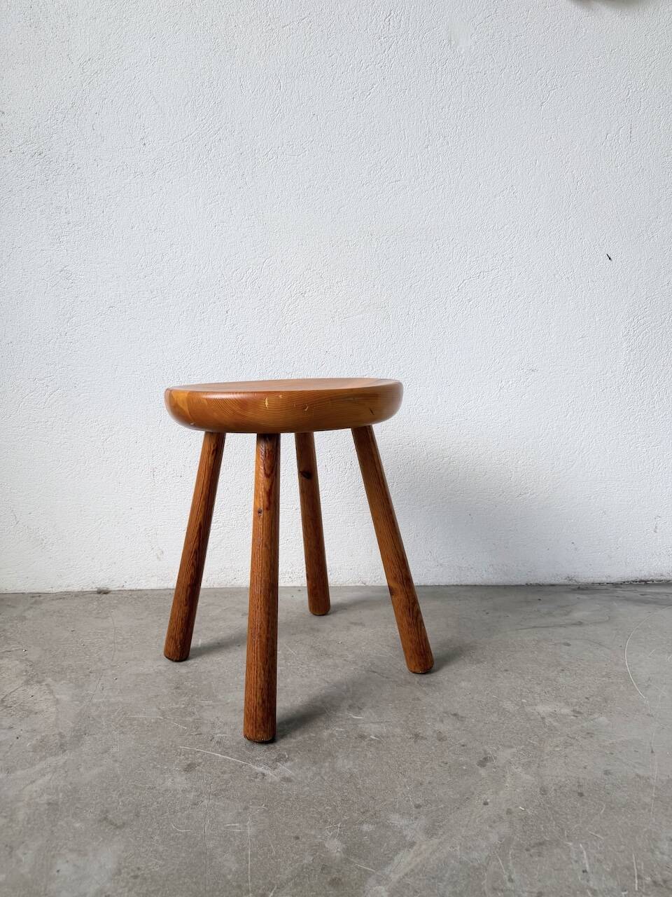 Pine stool assigned to Charlotte Perriand for Les Arcs.