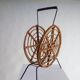 Mid-century round rattan magazine holder