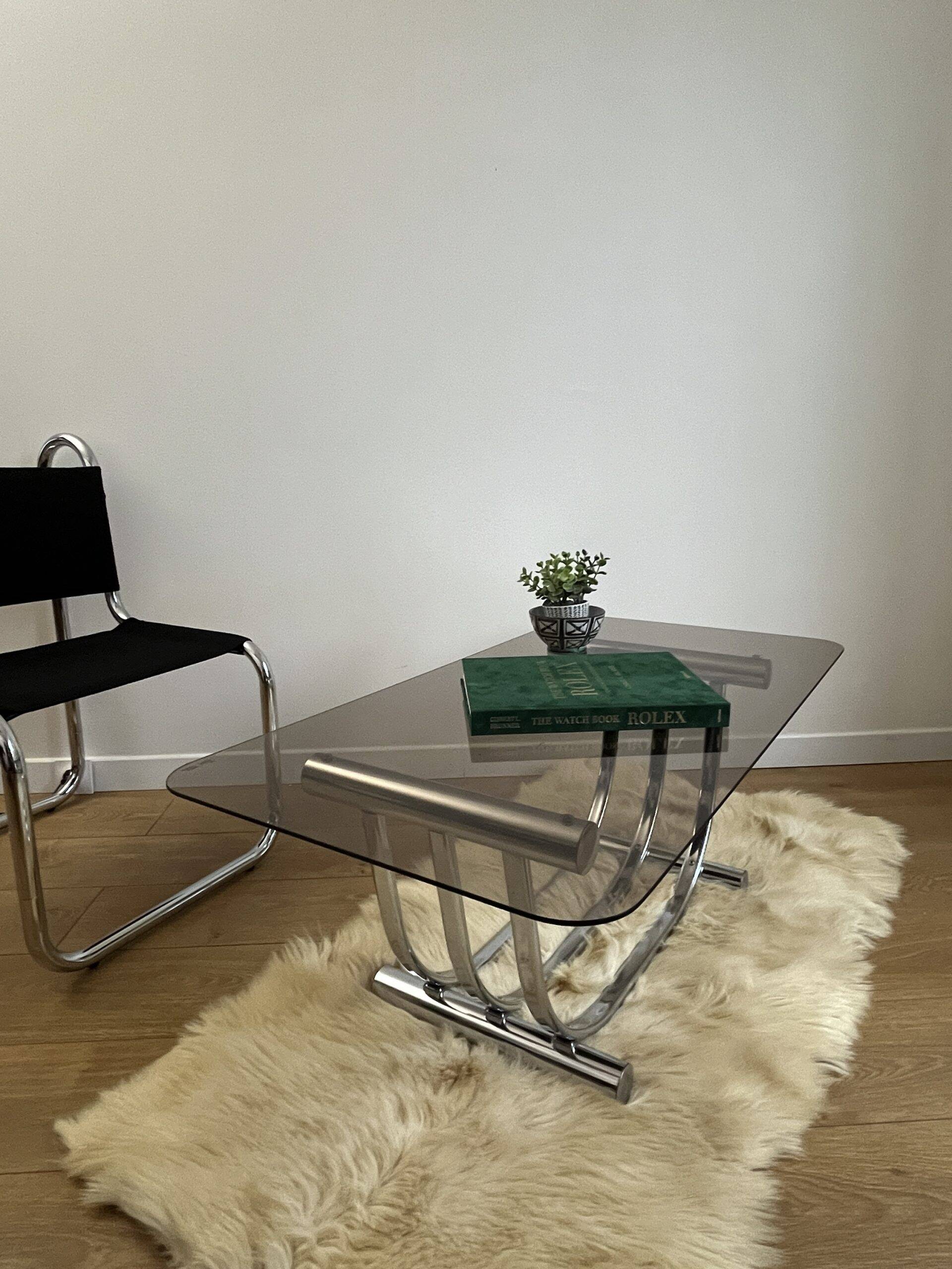 Smoked glass coffee table and chrome base by Yves Boutboul