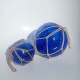 Two blue trawler balls