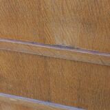 Vintage oak commode with tapered legs and wings from the 1950s.