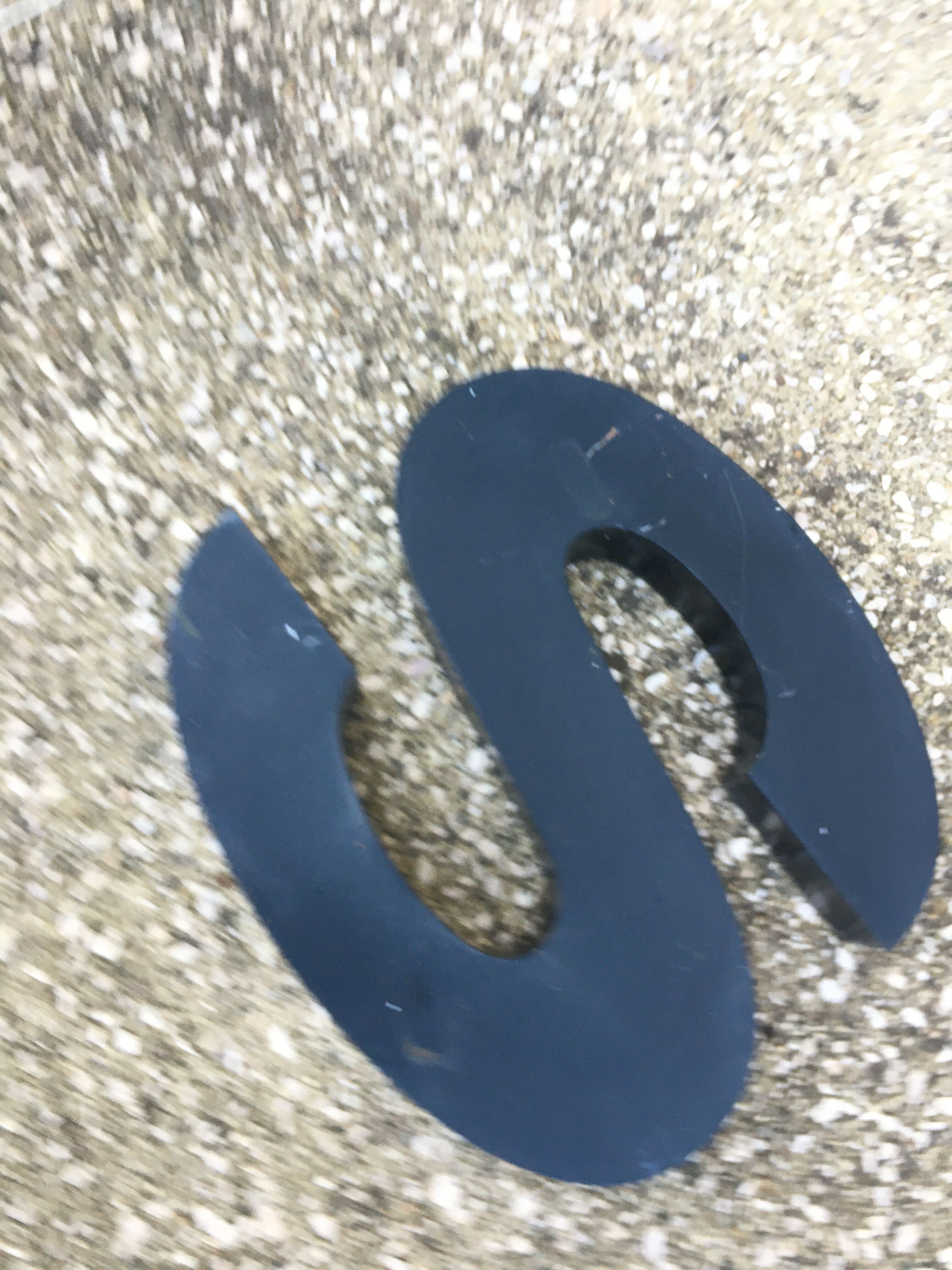 Vintage metal sign letter