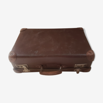 Old cardboard suitcase wooden handle