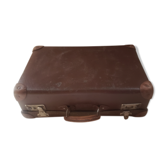 Old cardboard suitcase wooden handle