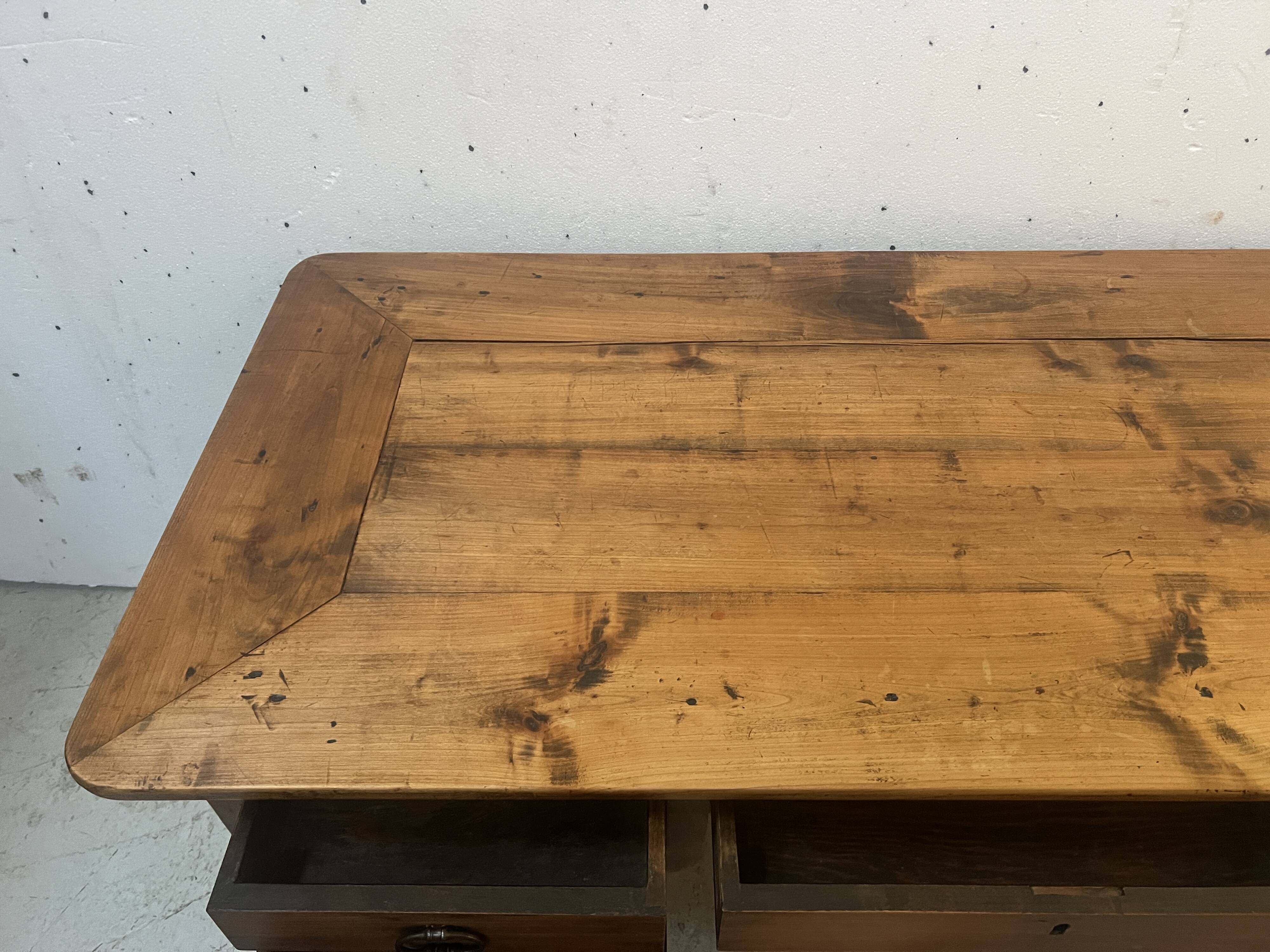 Provincial desk made of solid cherry wood, 20th century.