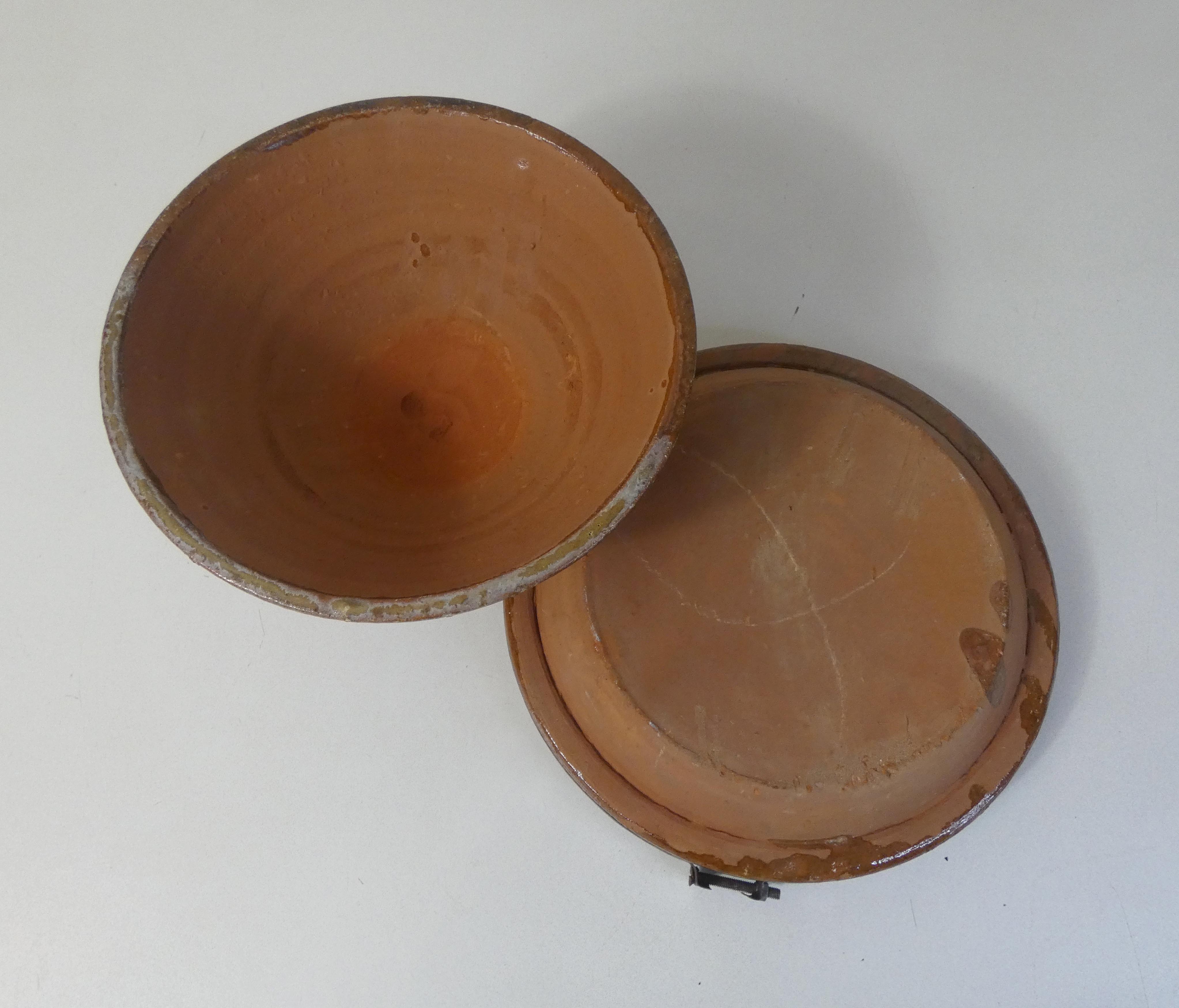 Old glazed terracotta tagine