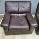 Pair of chocolate leather lounge chairs
