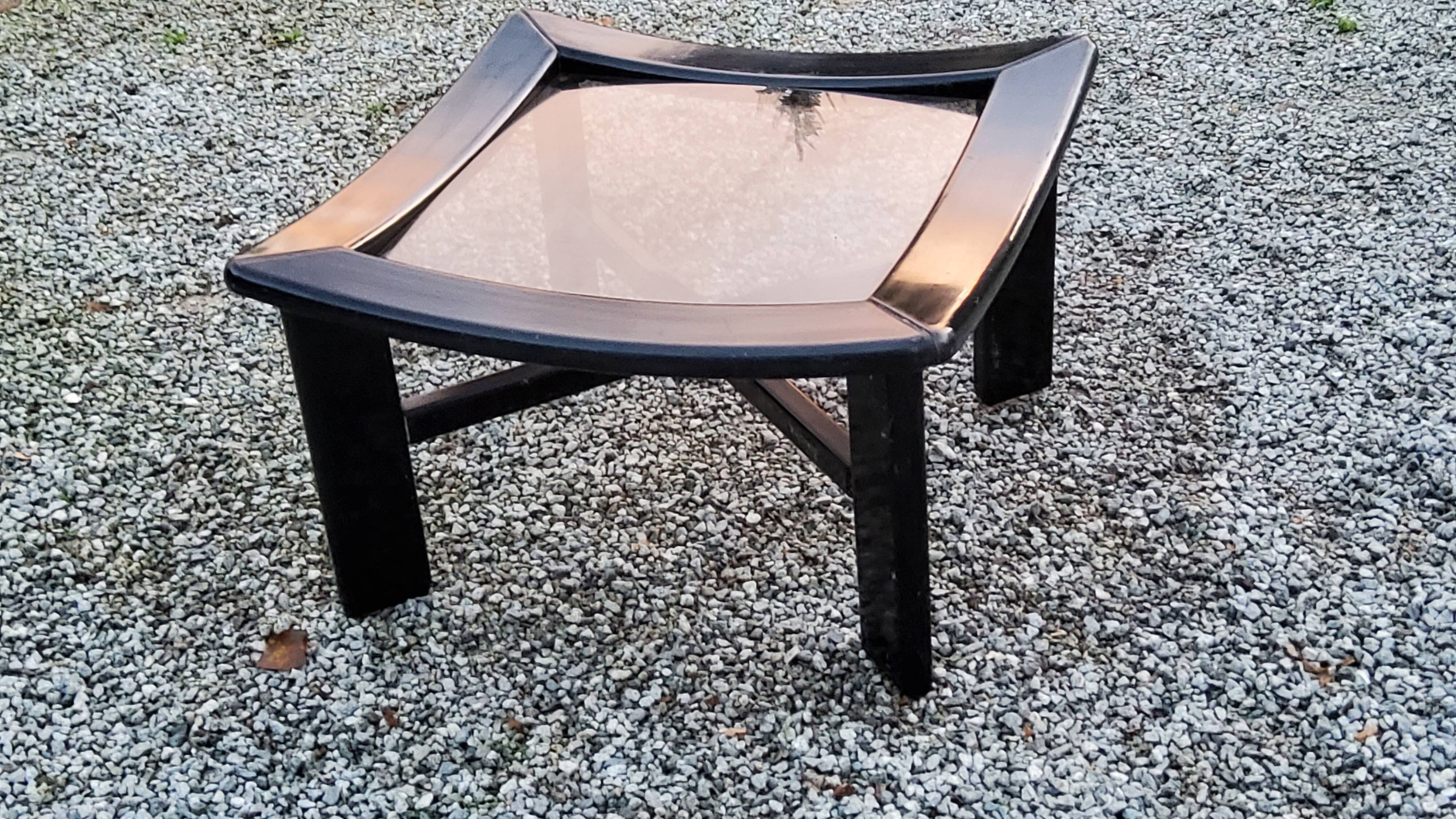 70s design coffee table in black lacquered wood with smoked glass top