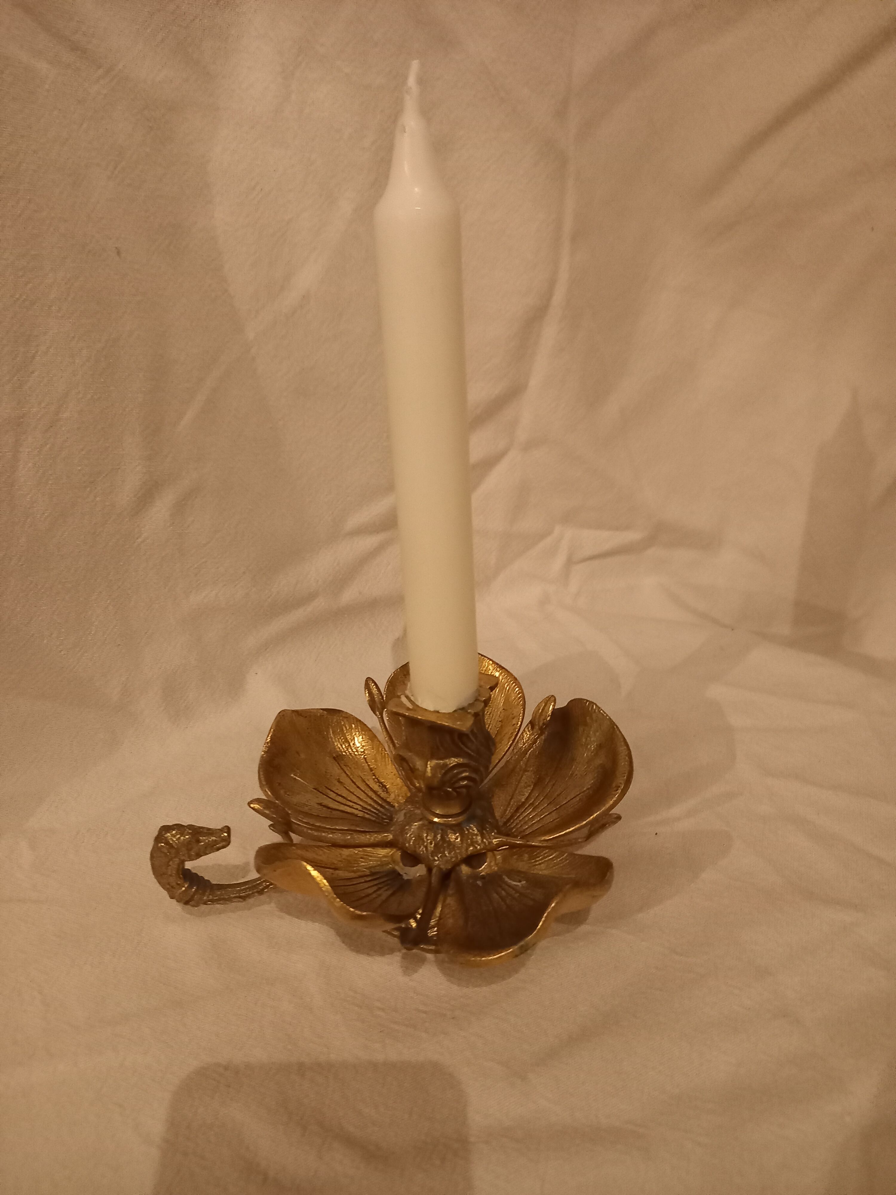 Brass flower candle holder