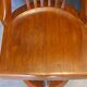 Swivel American chair in walnut and cast iron