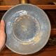 Stoneware plate signed J. Brisy