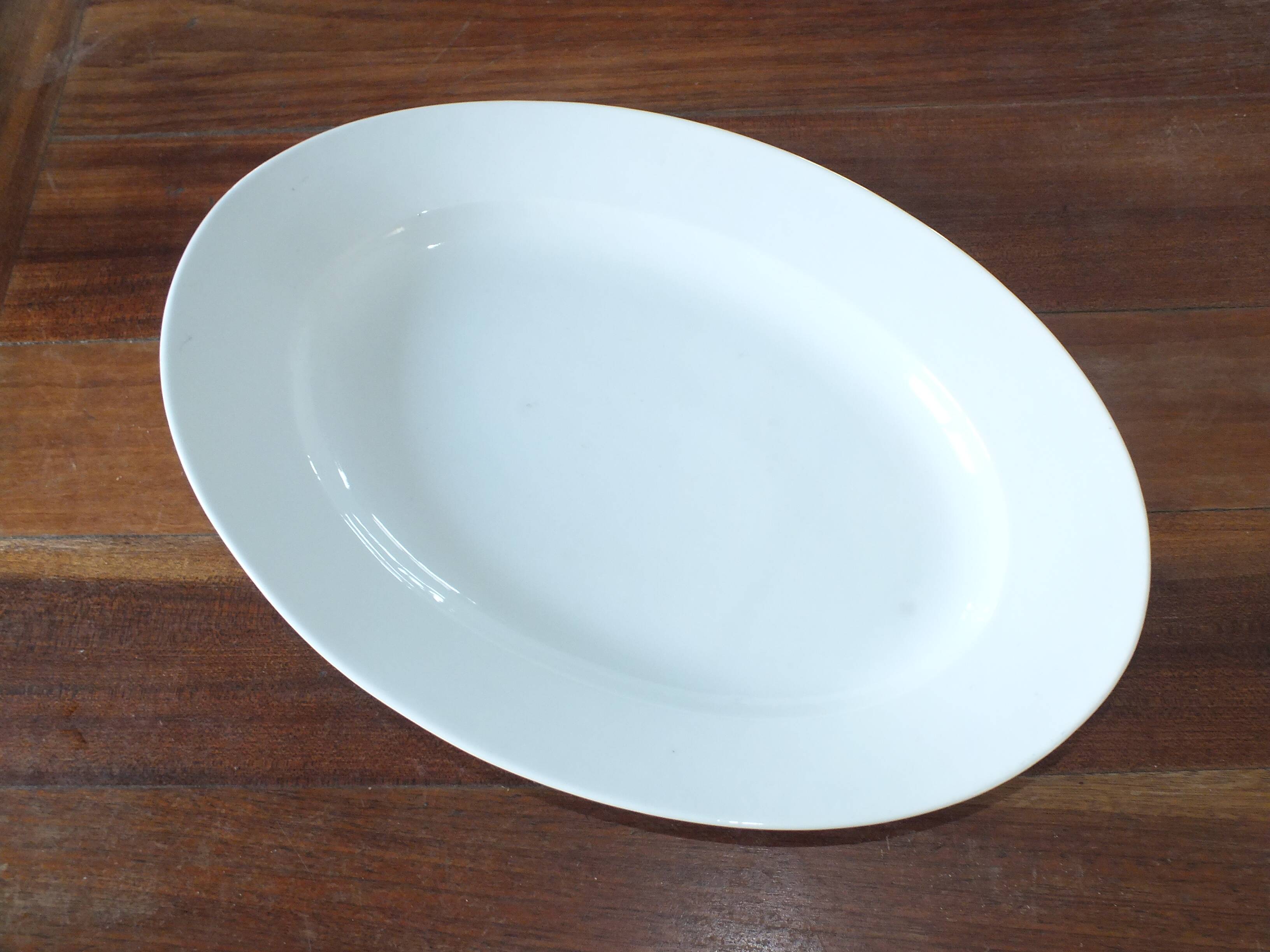 Large thick dish in white porcelain from Paris 19th