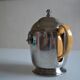 Insulated ceramic teapot with metal and felt 0.5 liters