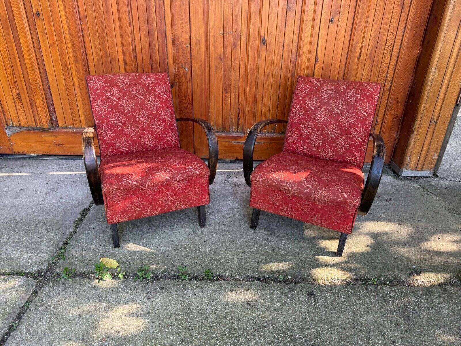 Pair of Art Deco burgundy armchairs in curved wood and fabric by Jindrich Halabala (1930s)