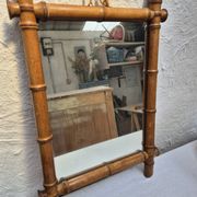 Vintage wooden mirror imitating bamboo