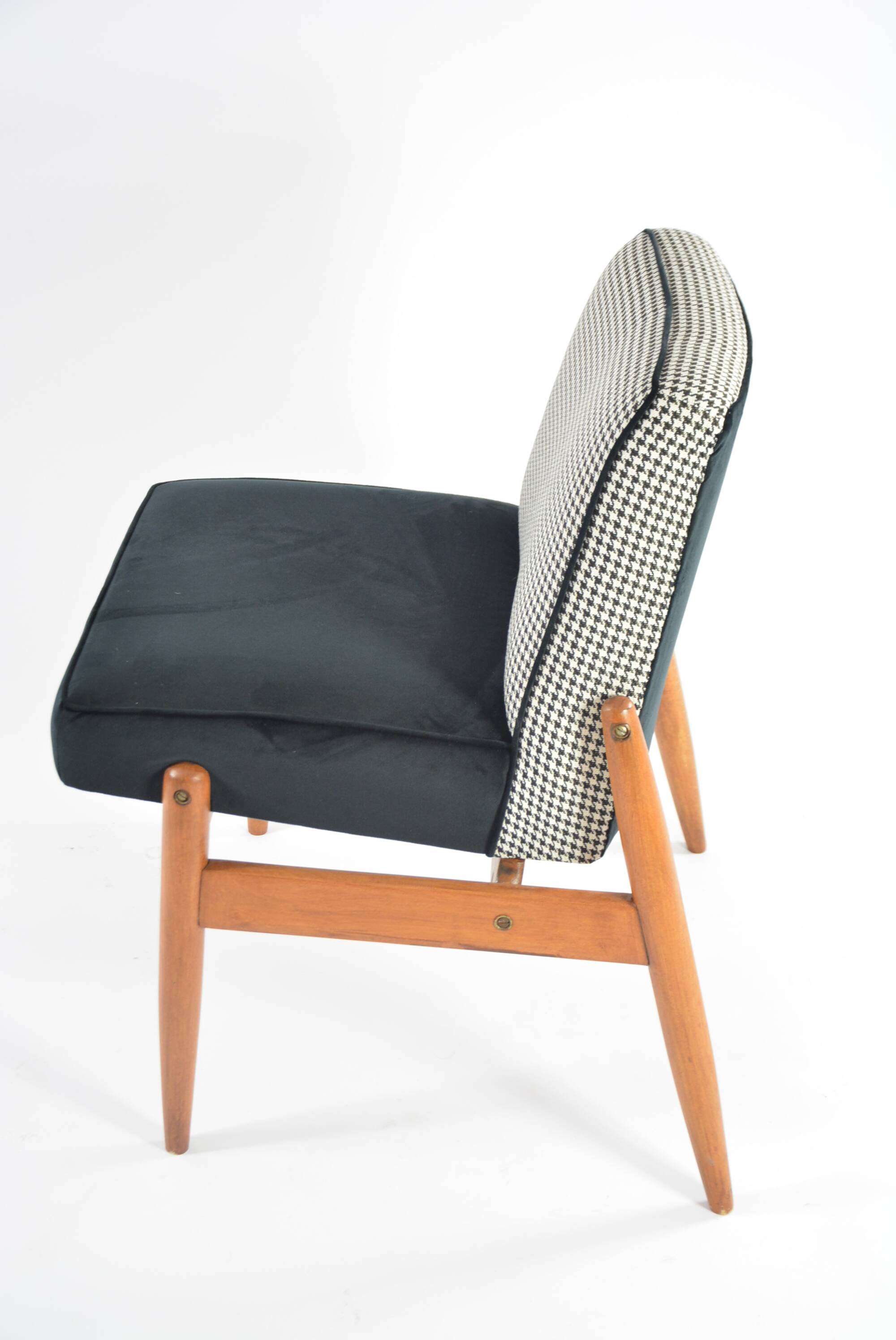 Black and white armchair without armrests